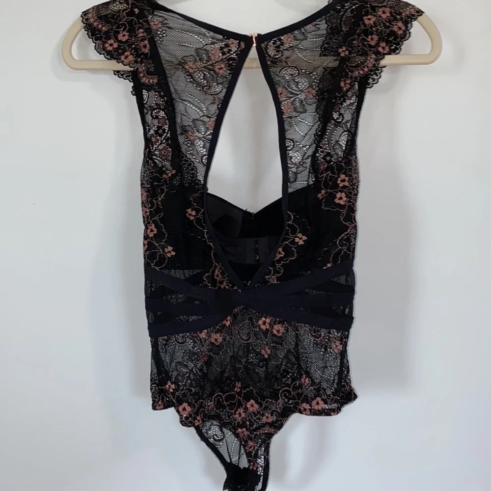 Sophie B. Floral Bodysuit. Size Small